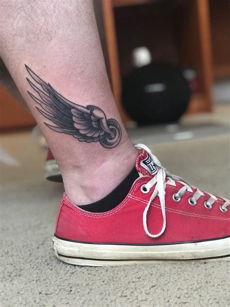 hermes winged shoes tattoo|chest wing tattoo.